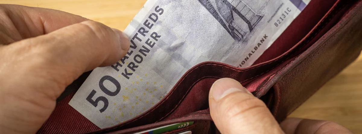 pengeseddel-50-danske-kroner-pung-istock.jpg